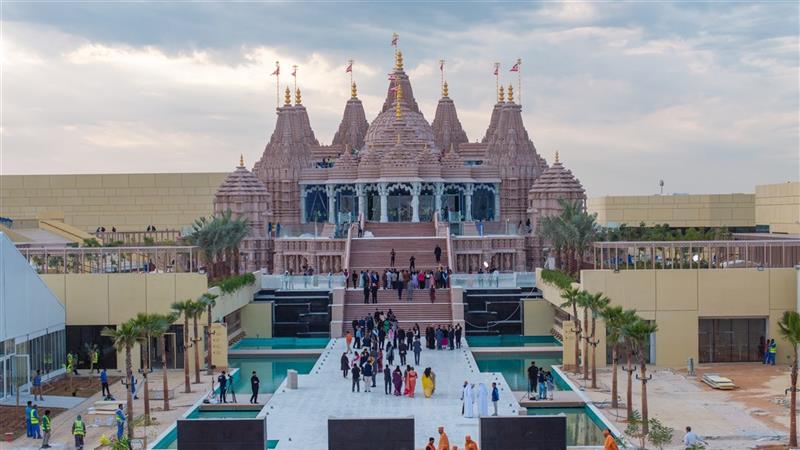 The BAPS Hindu Mandir Abu Dhabi with its seven shikharas and pink sandstone architecture
