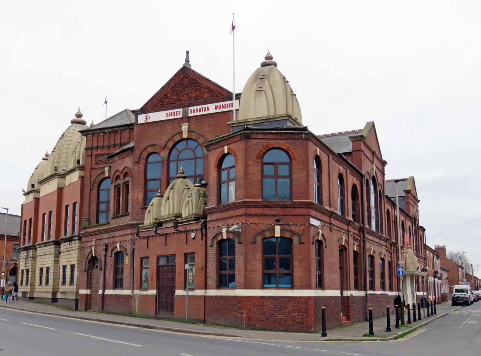 The ornate white-marble entrance with shikhara of Shree Sanatan Hindu Mandir in Leicester, England, the city's largest Hindu temple